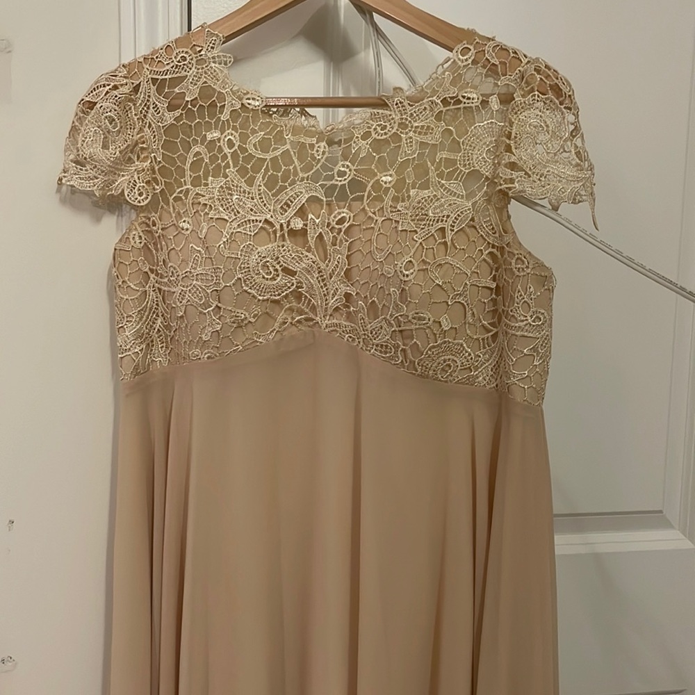 Maternity dress from JJ’s house! It is champagne colored.